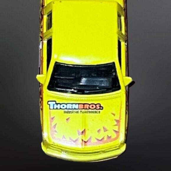 Hot Wheels Customized C3500 Truck Thorn Brothers Yellow/Orange Diecast Truck - Picture 2 of 7